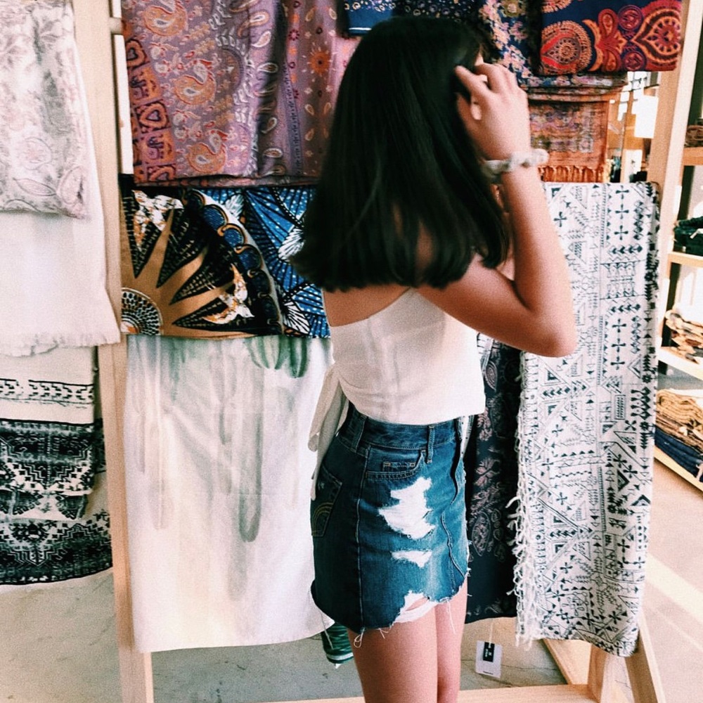 White pac sun tank top that ties in the back